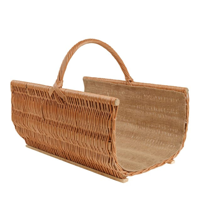 Panier à bûches en osier tressé marron clair avec anse.