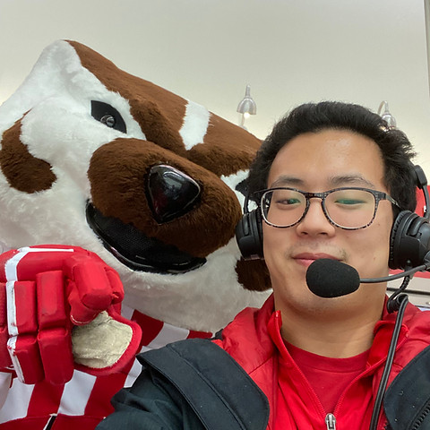 Anthony broadcasting at LaBahn Arena with Bucky Badger