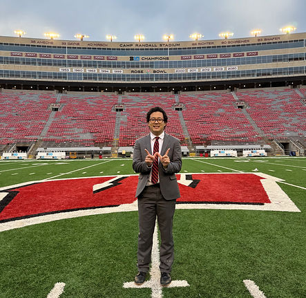 Anthony on the field at Camp Randall Stadium in Madison