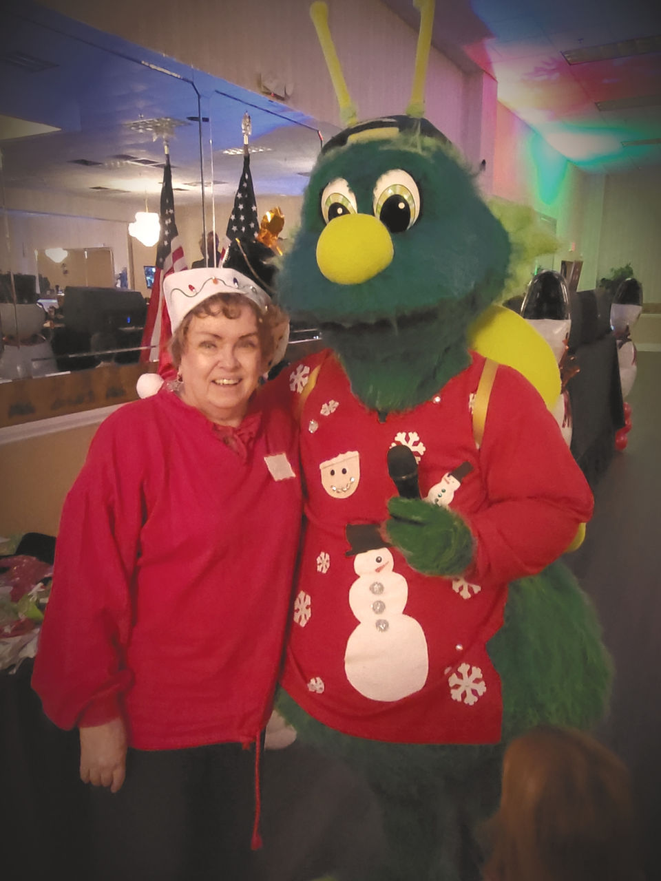 Pat and Fireflies mascot at the annual MFFC Christmas event