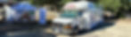 banner_tent_and_van.jpeg