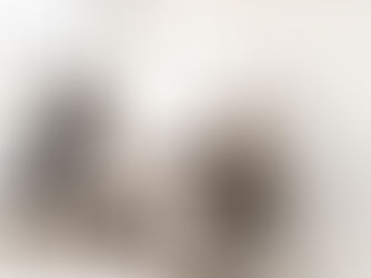 Confident black woman in a professional setting looking focused and empowered, representing career growth without burnout.