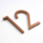 Thumbnail: Metal modern house numbers with copper finish on white background.