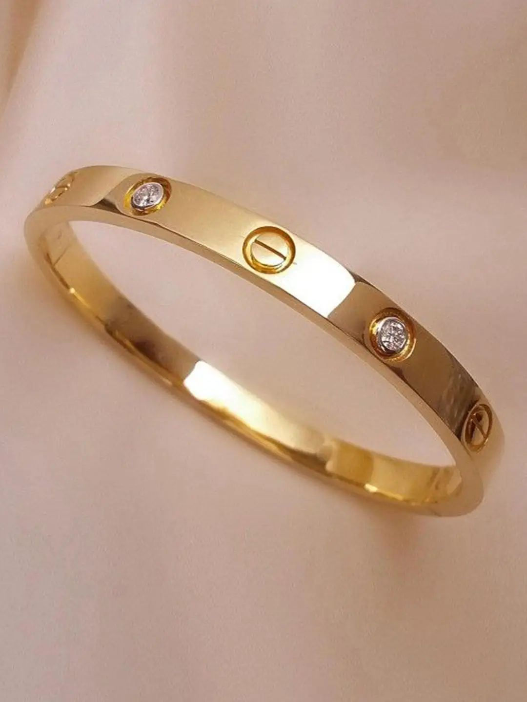 Gold Cartier Love bracelet