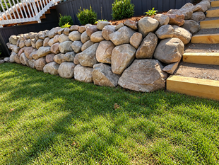 Boulder retaining wall Boulder Brothers LLC Houghton Lake Michigan