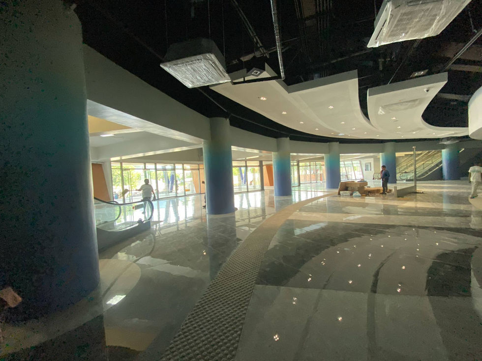 Modern AA2000 building lobby with blue pillars and polished floors