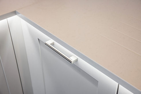 Caesarstone 4600 Organic white worktops, with under counter LED lighting fabricated by Som