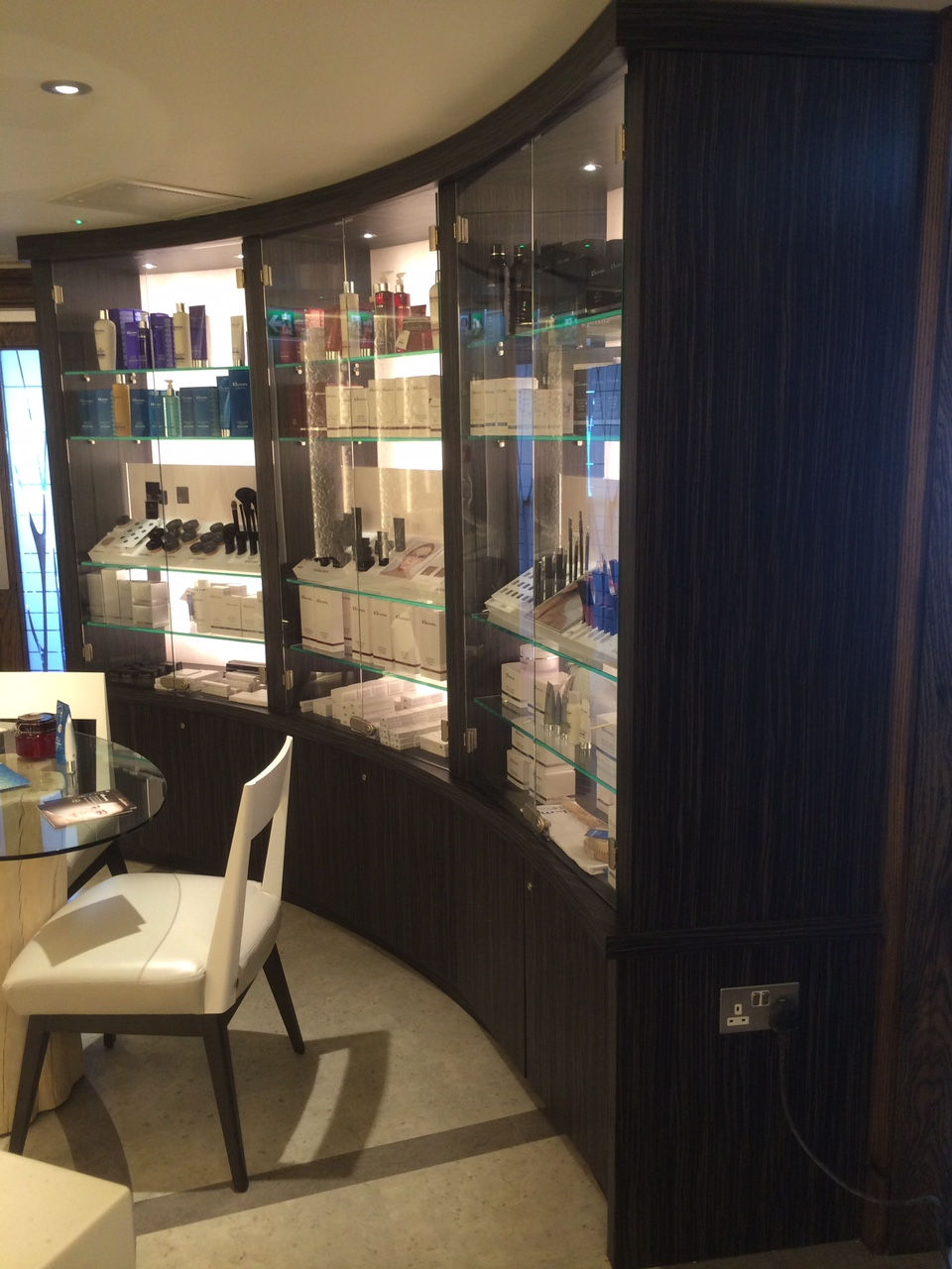 Curved glass display cabinet