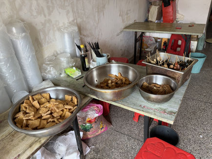 The Boss of the Street-Side Stall
