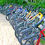 Thumbnail: Bicycles lined up along a fence