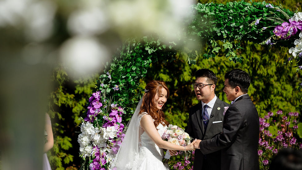 Wedding officiant guiding a couple through a Classic Celebration ceremony framework in Vancouver