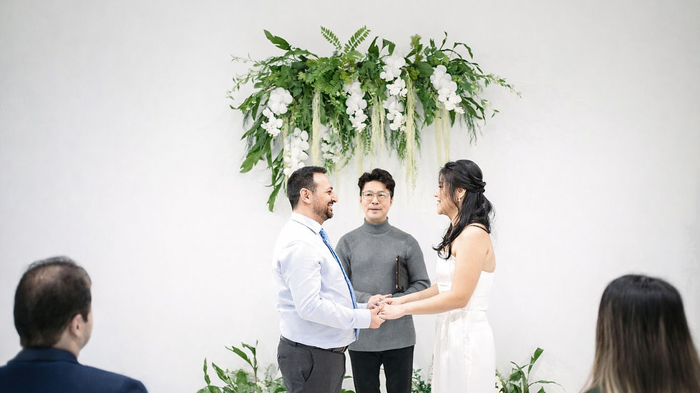 Ceremony-focused indoor micro wedding with family guests at The Ensora near Vancouver.