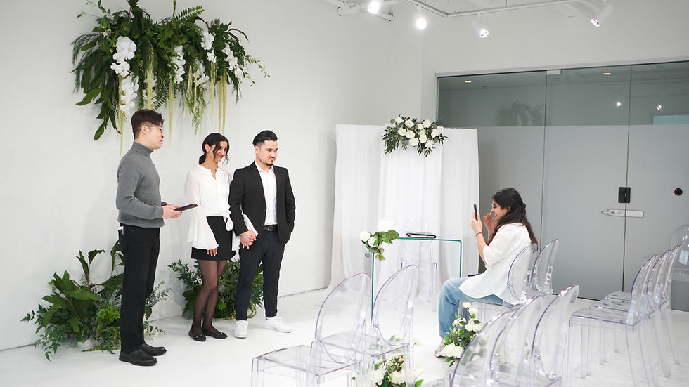 Indoor micro wedding ceremony with officiant and guests at The Ensora near Vancouver