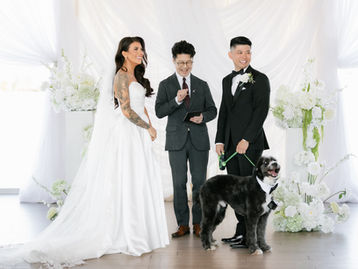 Dog standing with a couple during a Pawfect Witness pet-inclusive wedding ceremony in Vancouver