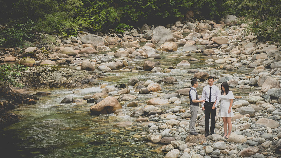 elopement ceremony at Lynn Headwaters with river and forest in Vancouver
