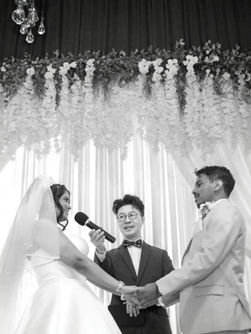 Couple Clevy and Alister during their wedding ceremony with Vancity Officiant in Vancouver