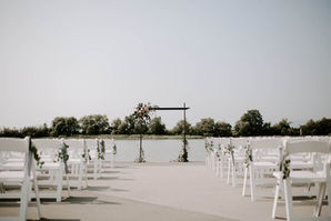 Outdoor ceremony setup by the water at UBC Boathouse, Richmond, BC