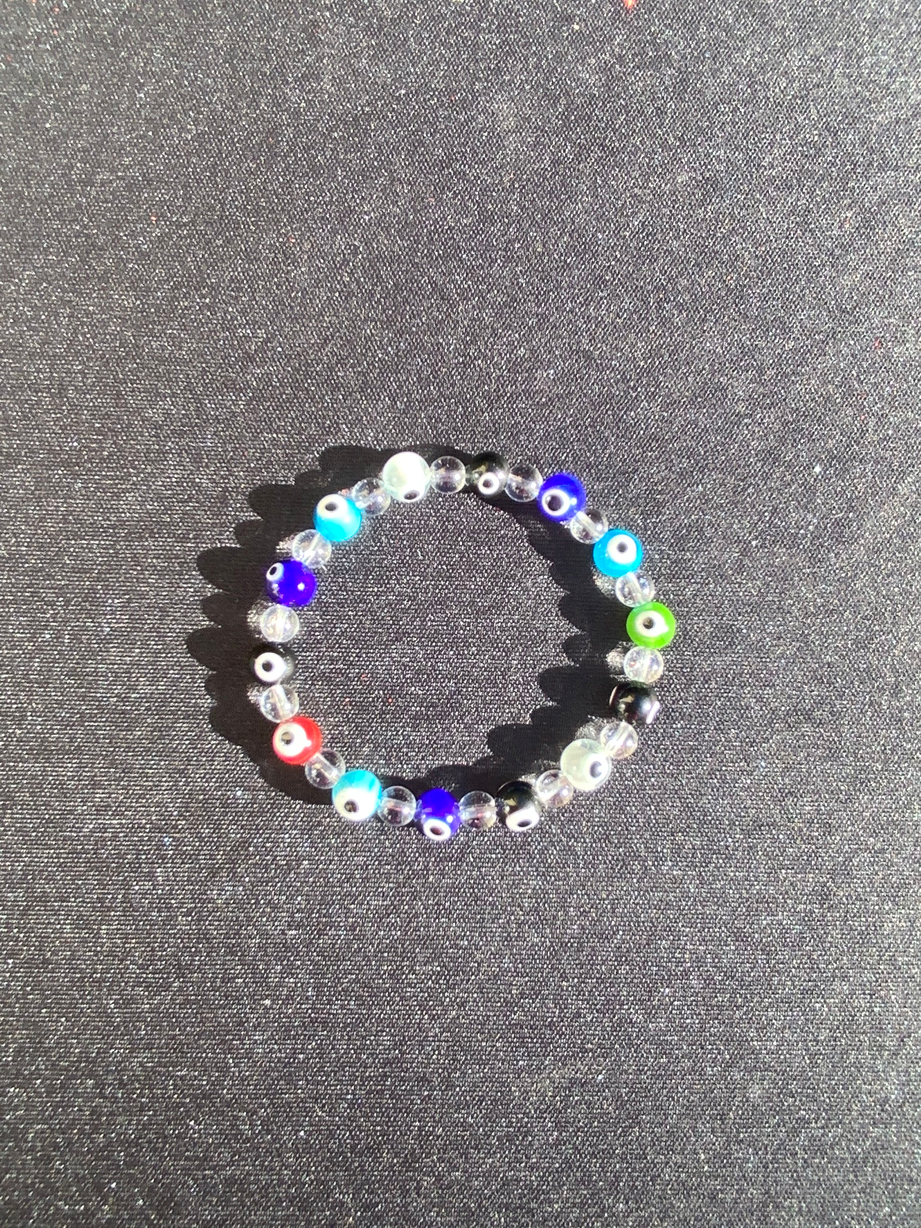 Multi-Colored Evil Eye with Clear Quartz