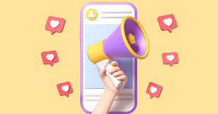 A hand holds a purple and yellow megaphone in front of a smartphone with like icons around, on a pastel yellow background.