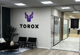 TOROX logo at office entrance, VetroLux Pro מחיצות זכוכית