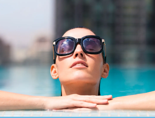 Woman relaxing at pool, IV therapy in Elkton, MD
