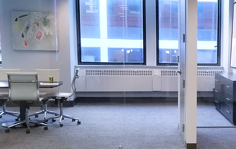 Legal People office renovation with in-house millwork, concrete and glazing