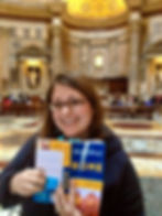 Woman with a Rick Steves Rome guide book inside the Pantheon