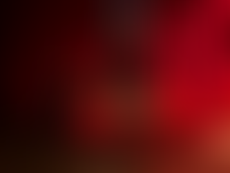 Mannequin in lingerie poses on a bed in a dimly lit room with red velvet curtains and decor, creating a sensual and mysterious atmosphere. Naughty Girl Motel. Sienna Sinclaire Studios. Gold metal bed frame. Window Display Designer Los Angeles