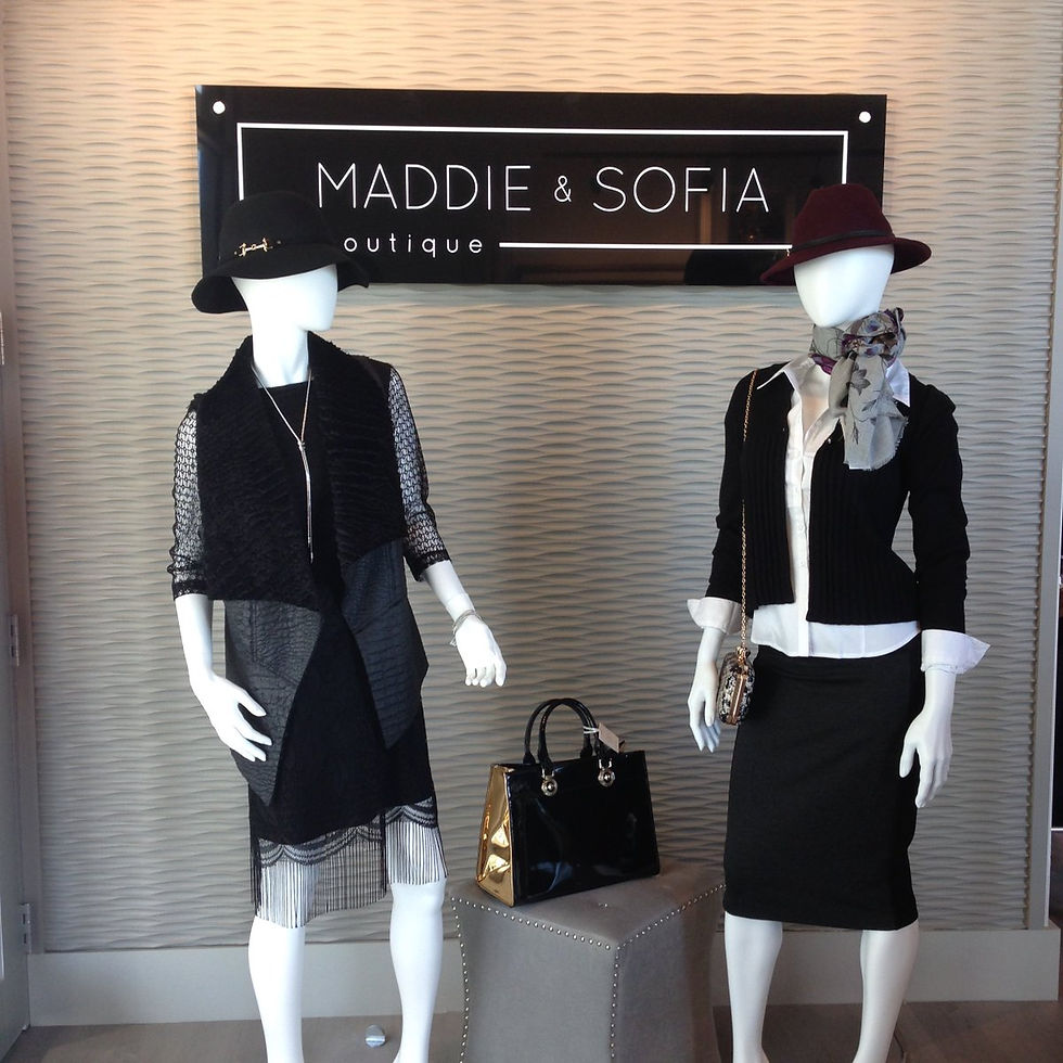Two of the mannequin inside of Maddie & Sofia located in Dieppe NB
