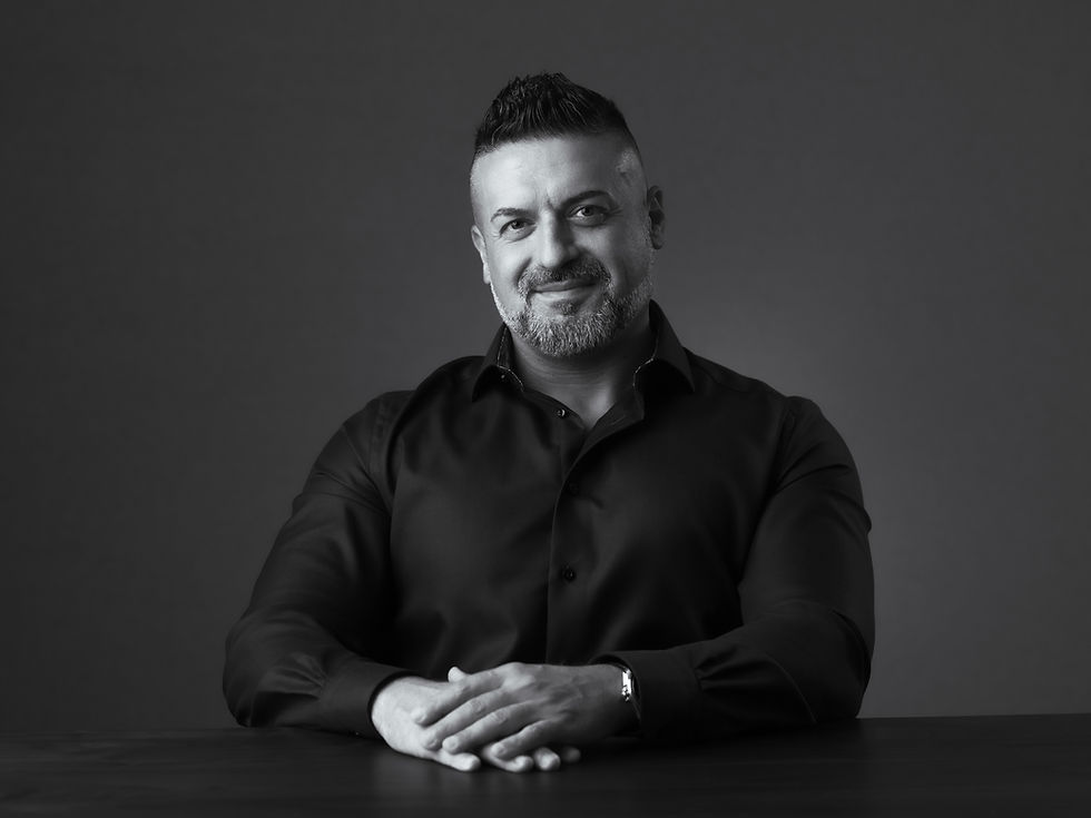 Project RAK CEO, Mike Shami, black and white portrait photo.