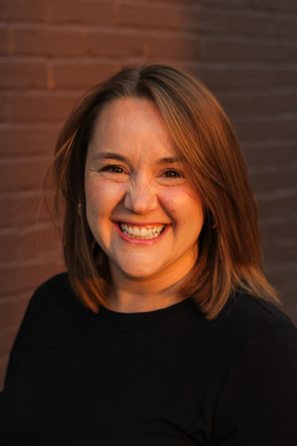 A woman smiling