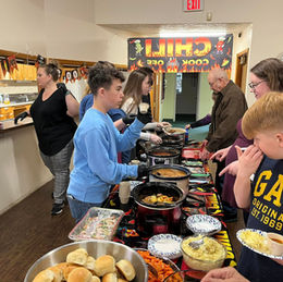 youth group serving chili