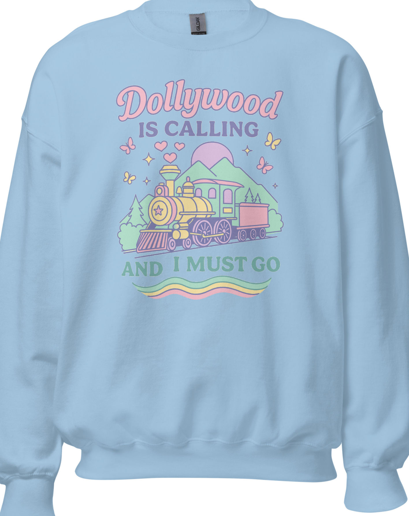 Dollywood Sweatshirt in blue with colorful retro train, butterfly, mountain, and theme park inspired graphic