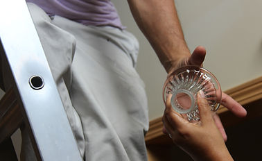 passing chandelier pieces with caution