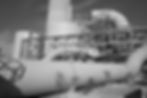 Site Erection of FRP Duct. Fiberglass pipe and large diameter tanks in background.jpg