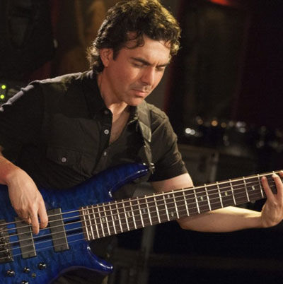 Artist, Adam Nitti playing Bass on stage