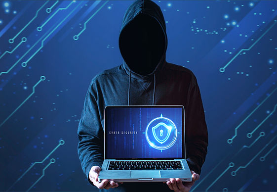 medium-shot-man-with-hoodie-holding-laptop.jpg