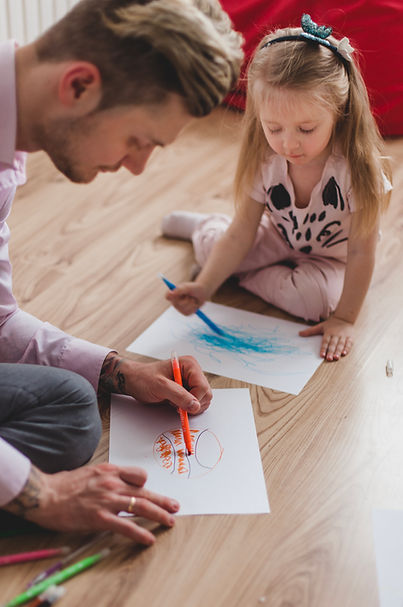 concentrated-father-daughter-drawing.jpg