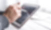 Man Using Smart Tablet.jpeg