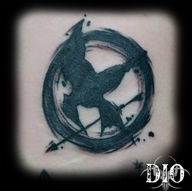 hunger games logo paint stroke.jpg