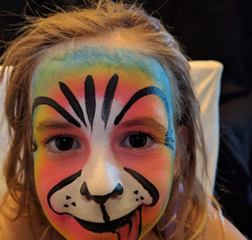 Child's face painting by Joanna's face painting - full face