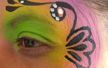 face painting with embellishment by Joanna's face painting