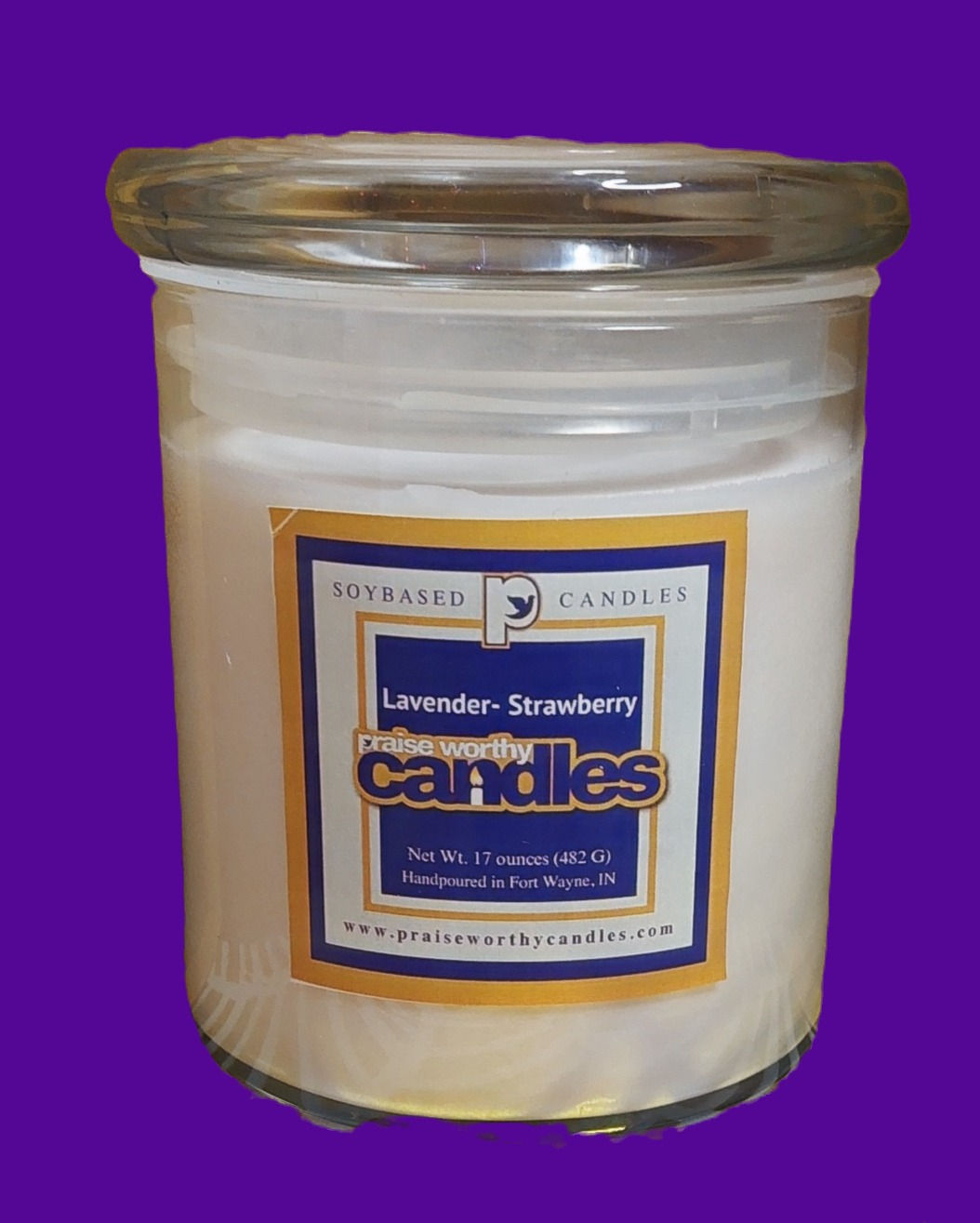 Lavender Strawberry scented soy candle in a clear glass jar