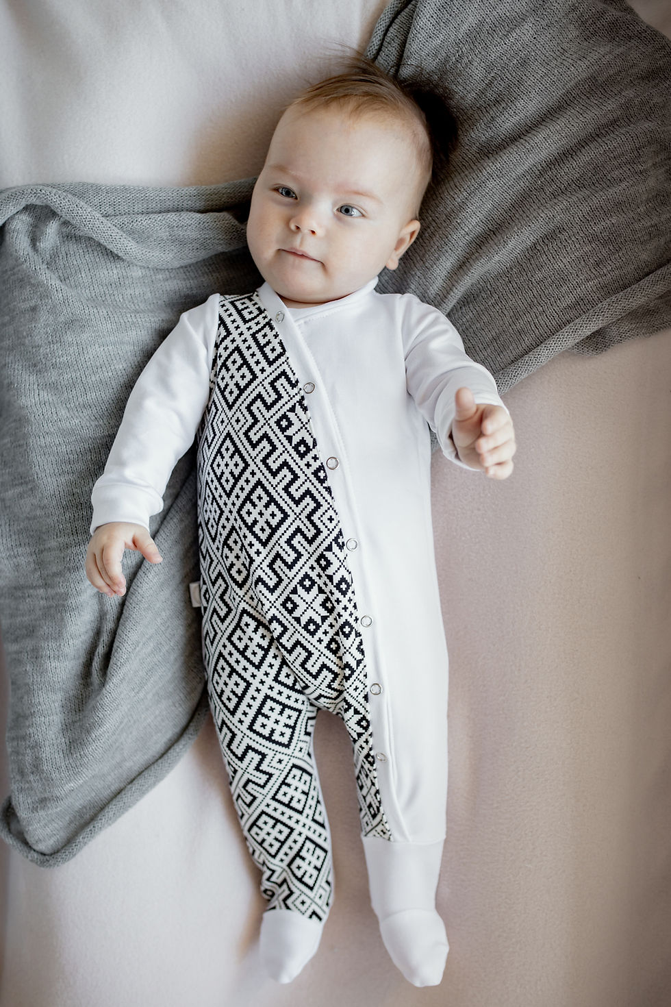 Thumbnail: Shop the Baltic baby jumpsuit in white at Nord Haus