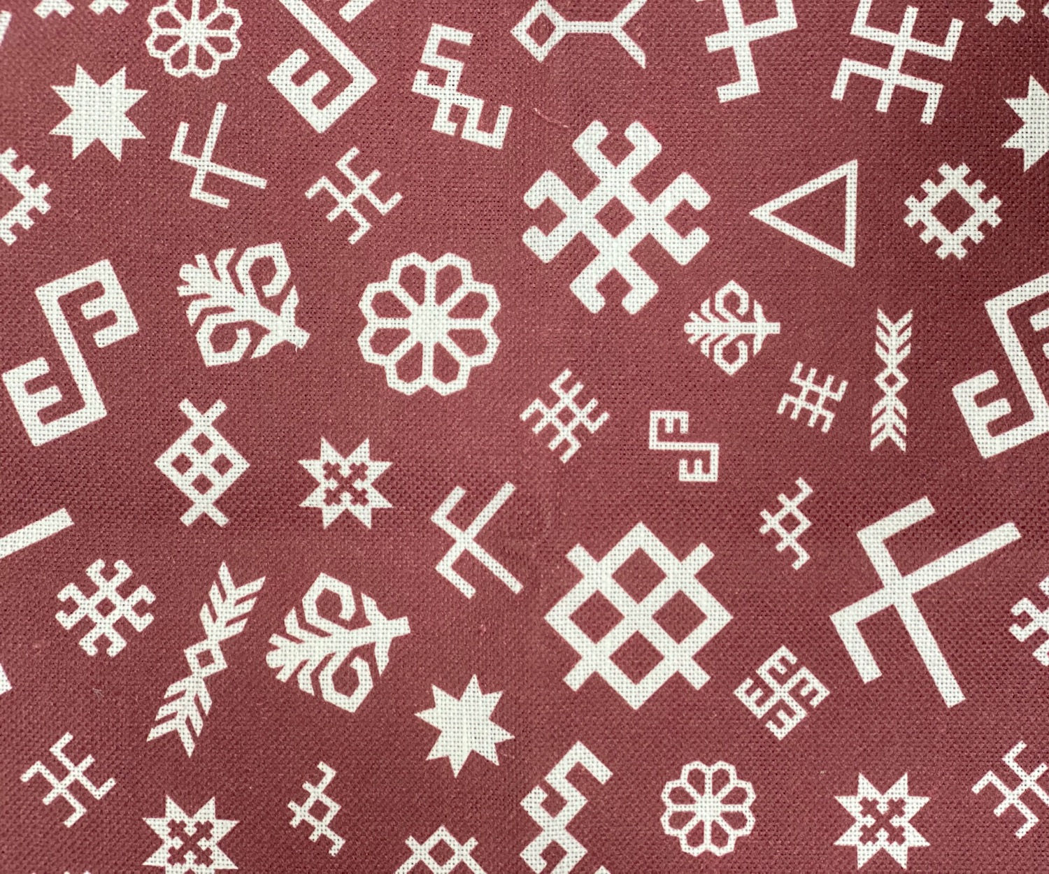 Shop the red and white ethnographic tea towel from Nord Haus Shop