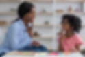 african-american-speech-therapist-working-with-little-girl-clinic (1).jpg