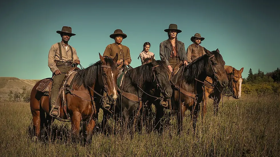 Cast members from The Abandons on horseback in an open field, dressed in Western attire and facing the camera under a clear sky.