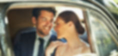 Bride and Groom Through Car Window