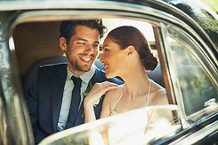 Bride and Groom Through Car Window