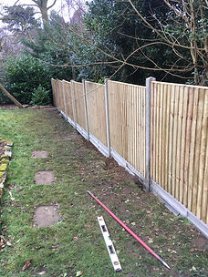 Six foot high close board paneled fence using concrete posts including concrete end and corner posts. one foot high concrete gravel boards and five foot high close board panels. Installed in Boxford, Suffolk. 